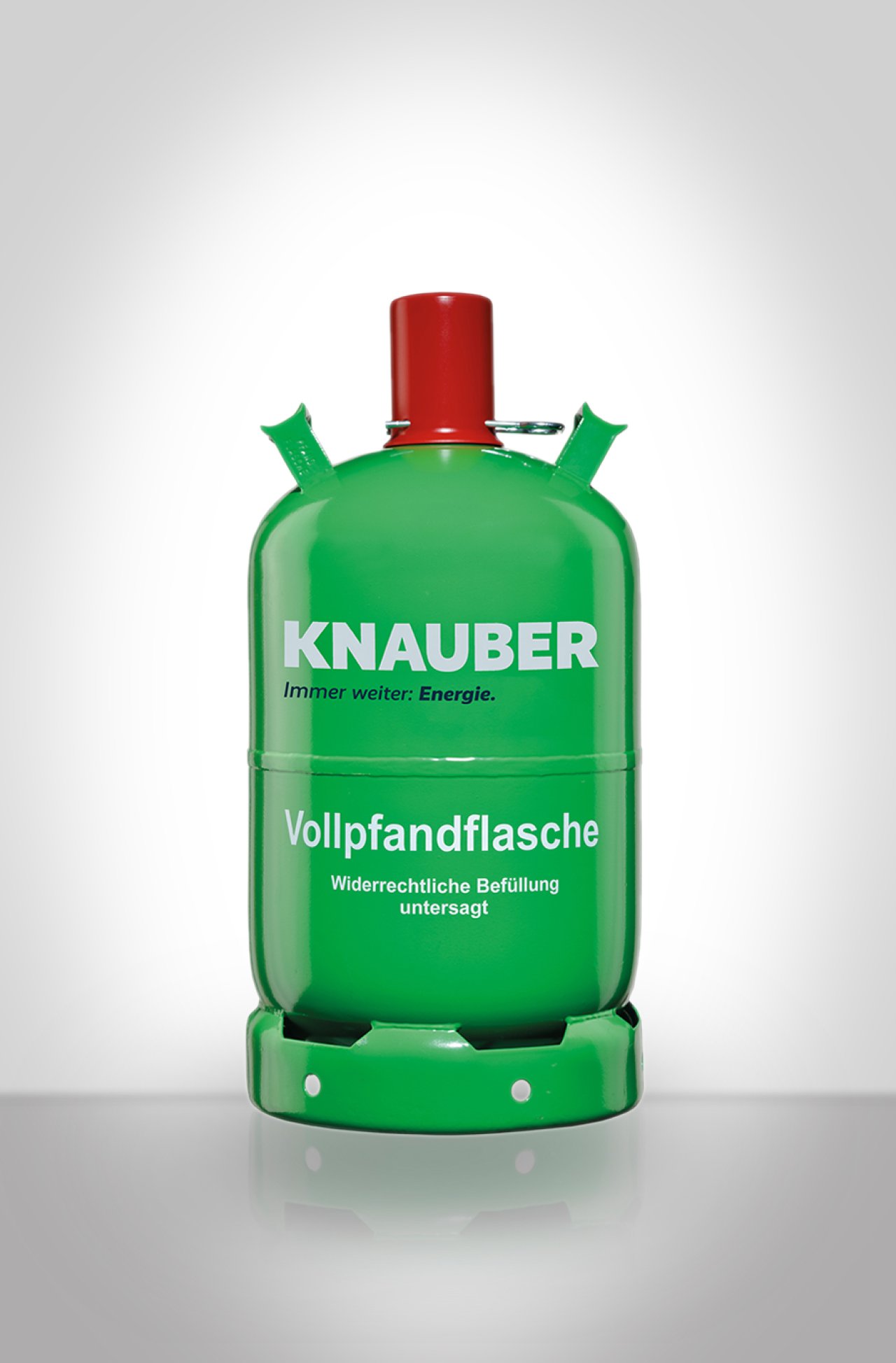 Eine grüne Gasflasche mit der Aufschrift Vollpfand.